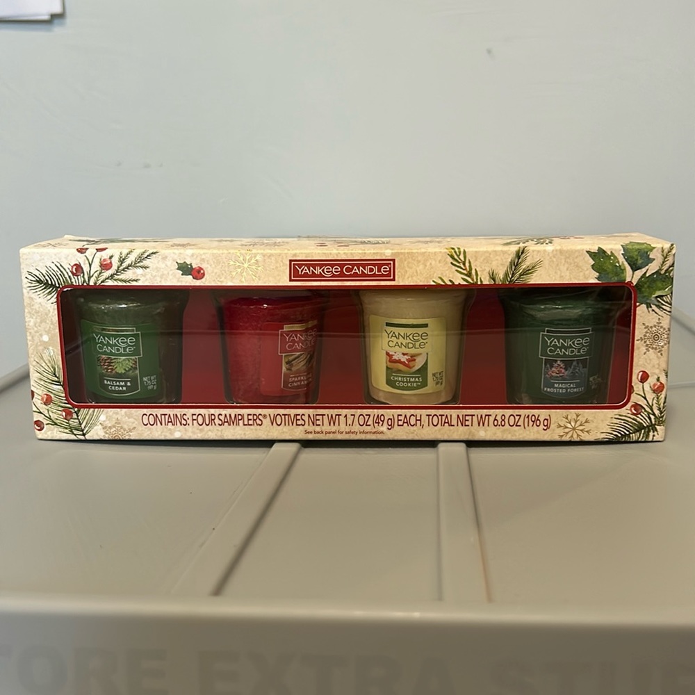 Brand new Yankee Candle holiday sampler votive set with 4 candles